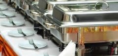 banquet table with chafing dish heaters and canapes