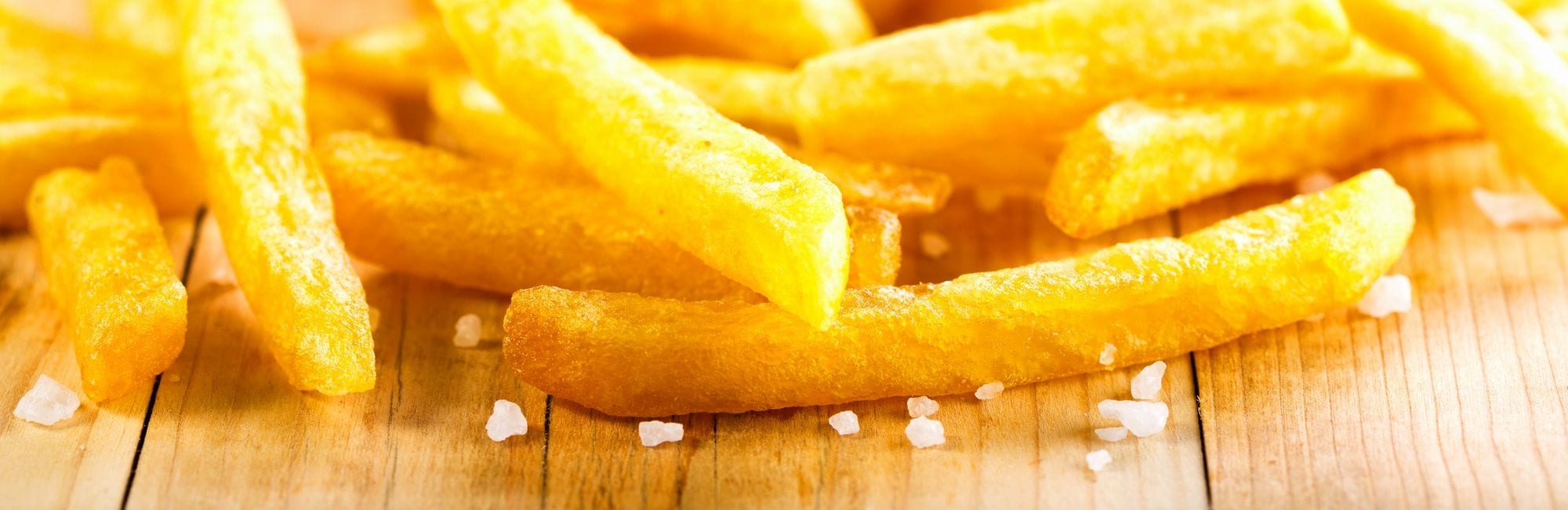 french fries on wooden table