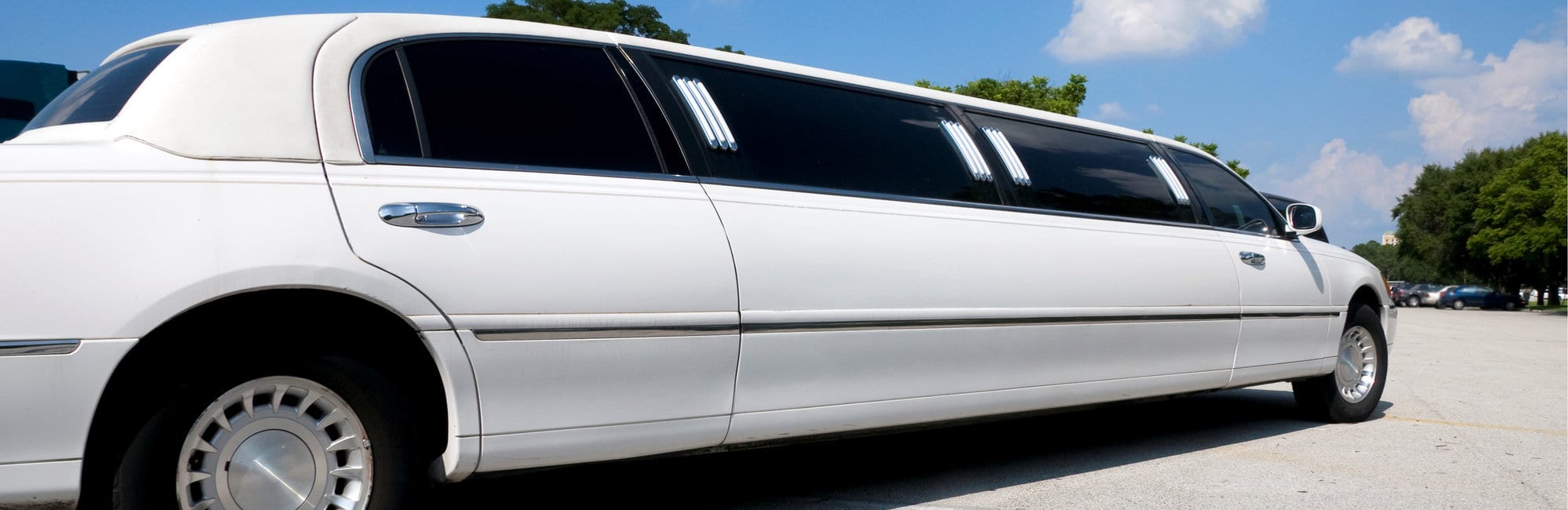 Black Stretch limousine waiting for guests to arrive